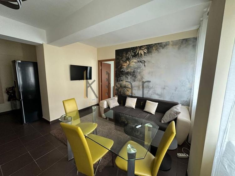 Apartament cu 3 camere semidecomandat, mobilat în Central