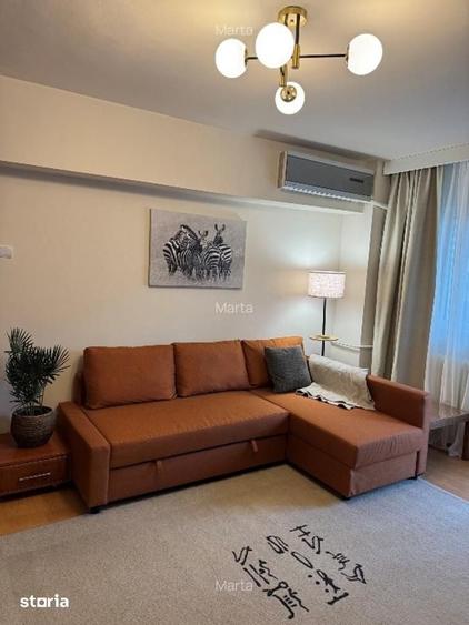 Apartament cu 3 camere semidecomandat în Tineretului