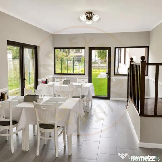 Casă cu 14 camere cu Teren 900 Mp în Central