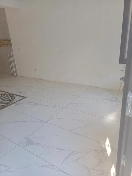 Casă cu Teren 100 Mp în Central