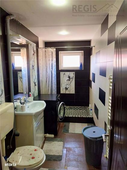 Apartament cu 3 camere decomandat în Tractorul
