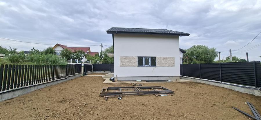 Casă individuală cu 4 camere cu Teren 310 Mp în Holboca