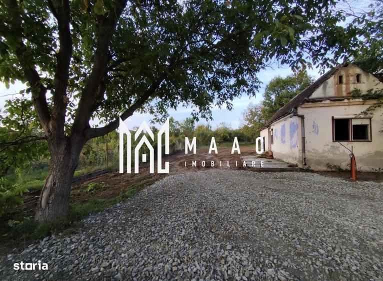 Casă cu 3 camere cu Teren 1400 Mp în Central