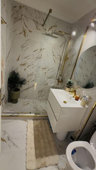 Apartament cu 3 camere decomandat în Calea București