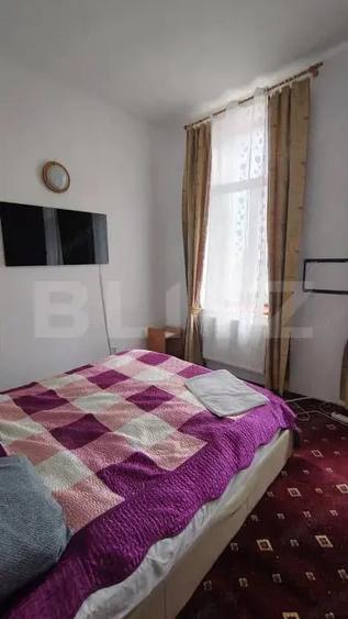 Casă cu 11 camere cu Teren 670 Mp în Clăbucet