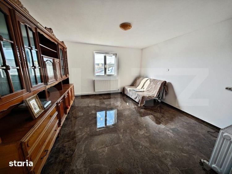 Casă cu 4 camere cu Teren 500 Mp în Lețcani