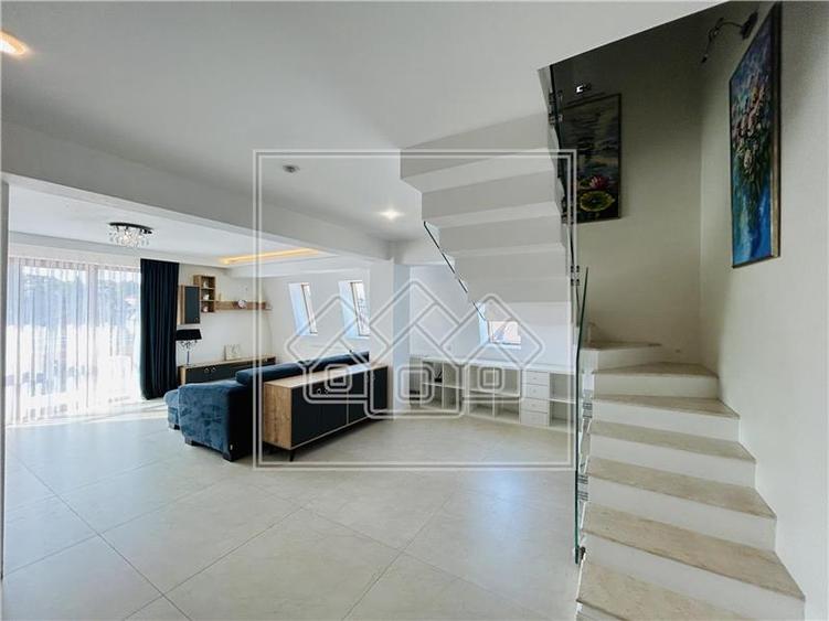 Ap pe 2 niveluri, 75 mp utili + 2 balcoane, mobilat modern - 5