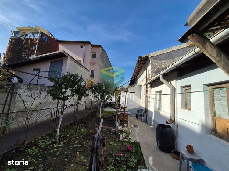 Teren de 424 mp, în Romană