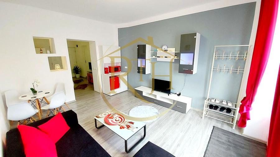 Apartament cu 2 camere semidecomandat, mobilat în Central