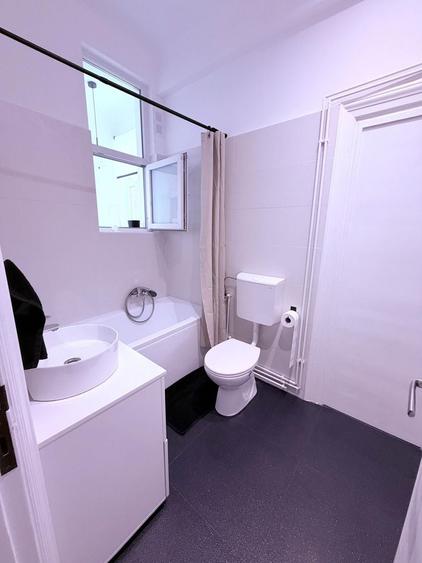 Apartament cu 3 camere, mobilat în P-ța Romană