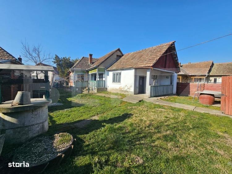 Casă cu 4 camere cu Teren 1000 Mp în Sâncel