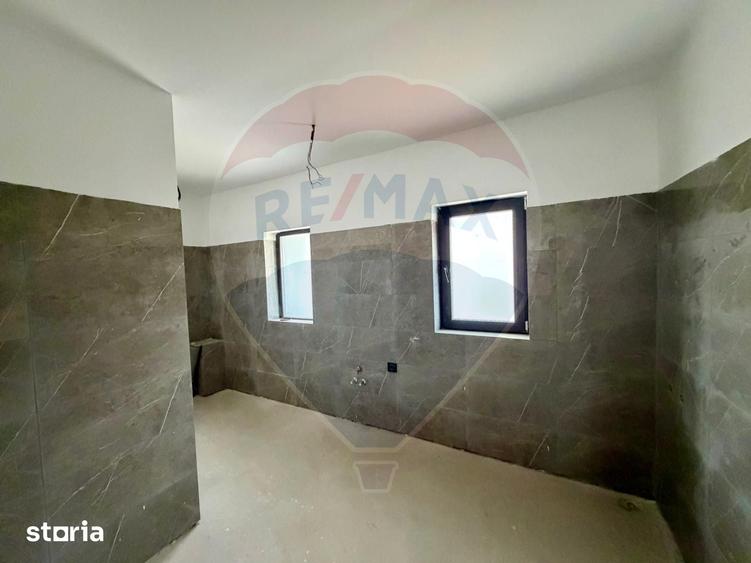 Casă cu 4 camere cu Teren 200 Mp în Central