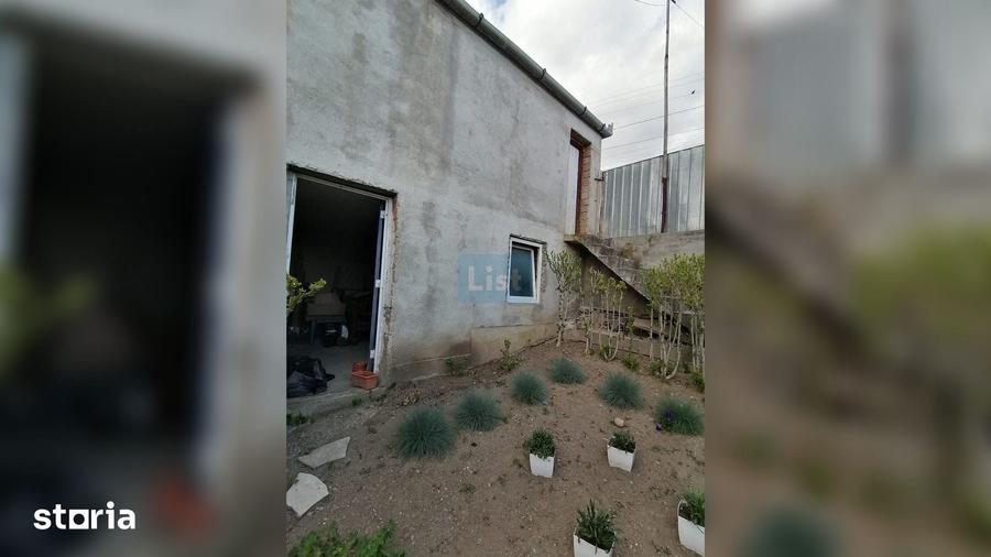 Casă cu 2 camere cu Teren 389 Mp în Central