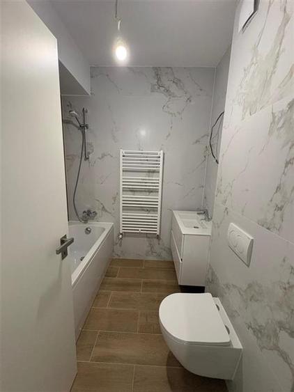 Apartament cu 2 camere decomandat în Tractorul