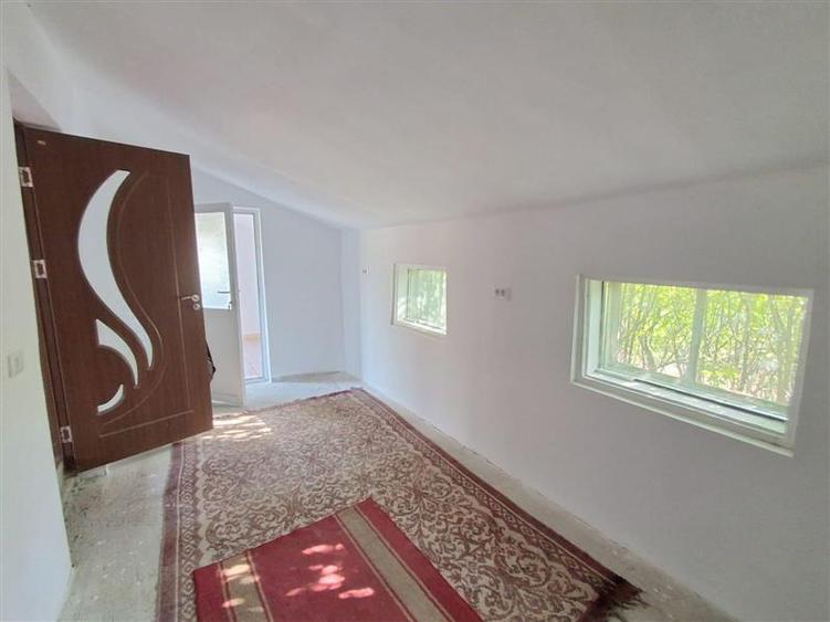 Casă individuală cu 2 camere cu Teren 1688 Mp în Movileni