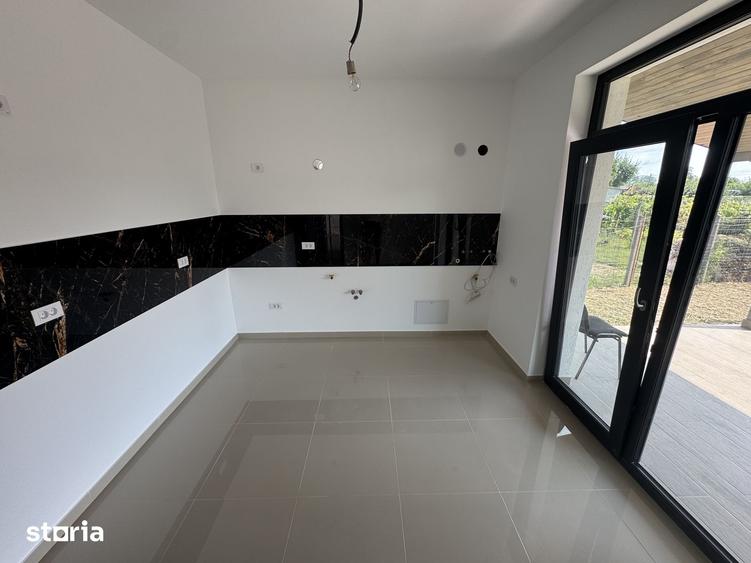 Casă cu 3 camere cu Teren 450 Mp în Holboca