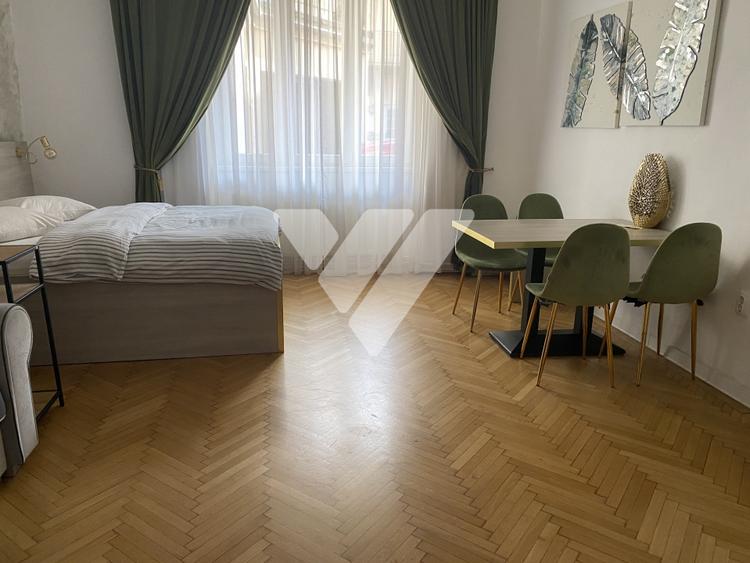 Apartament cu 2 camere semidecomandat, mobilat în Central