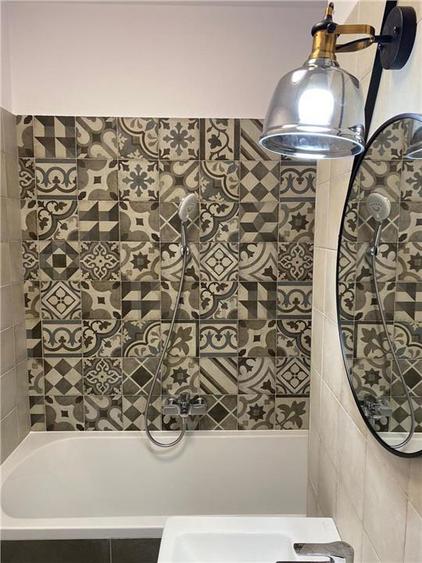 Apartament cu 2 camere semidecomandat, mobilat în Take Ionescu
