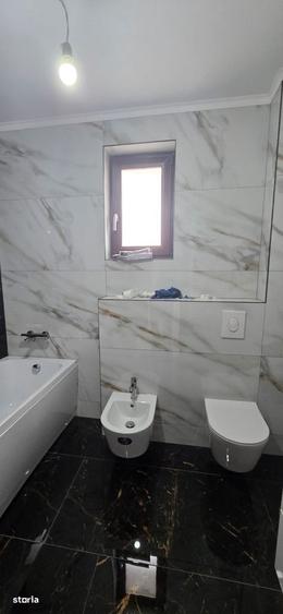 Casă cu 4 camere cu Teren 600 Mp în Bradu