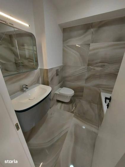 Apartament cu 3 camere decomandat în Polonă