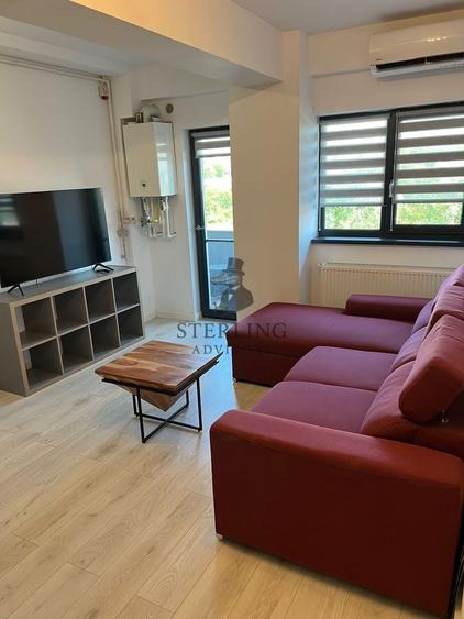 Apartament cu 2 camere semidecomandat, mobilat în 1 Mai