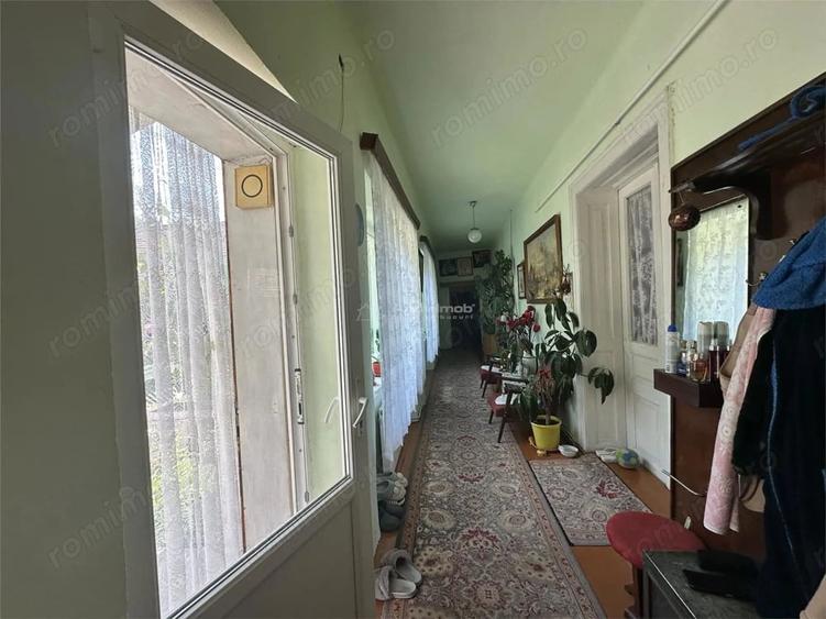 Casă cu 4 camere cu Teren 1000 Mp în Est