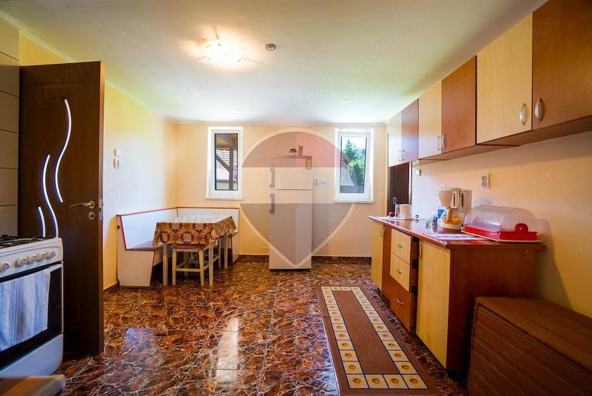 Casă cu Teren 565 Mp în Zizin