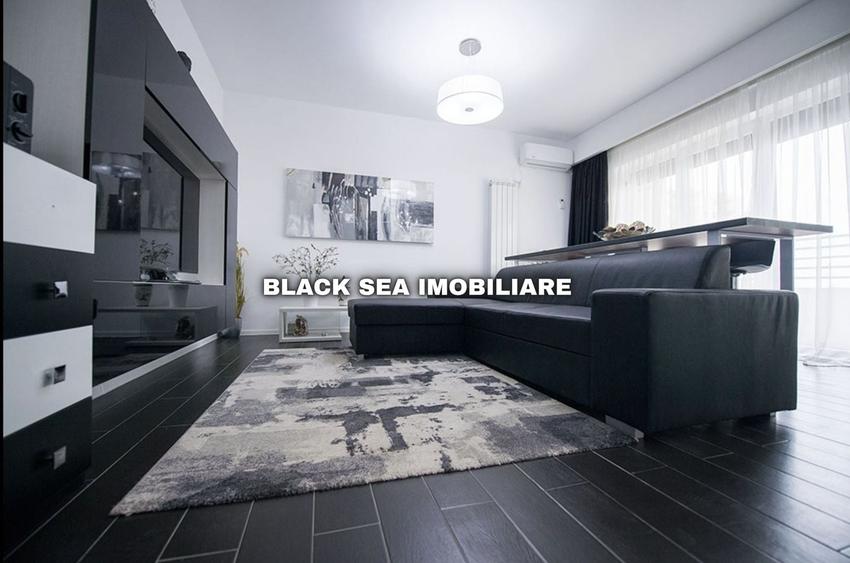 Apartament cu 2 camere semidecomandat, mobilat în Central