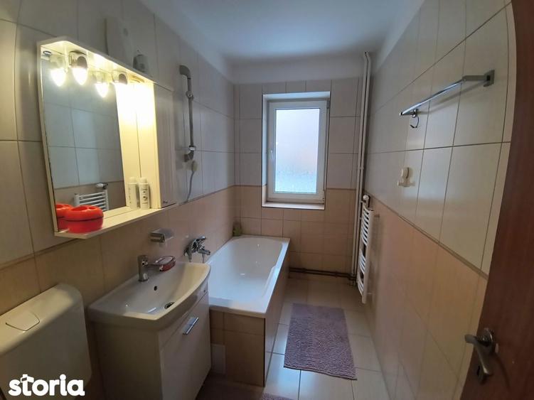 Apartament cu 2 camere semidecomandat, mobilat în Central