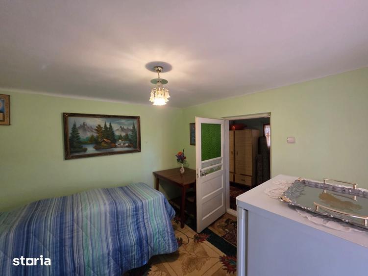 Casă cu 2 camere cu Teren 1200 Mp în Central