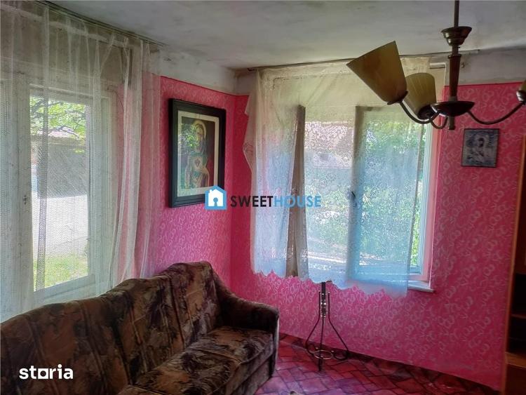 Casă cu 3 camere cu Teren 1250 Mp în Beclean