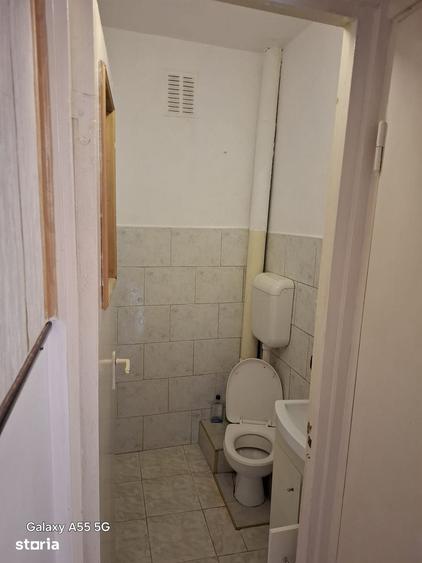 Apartament cu 3 camere decomandat în Tractorul