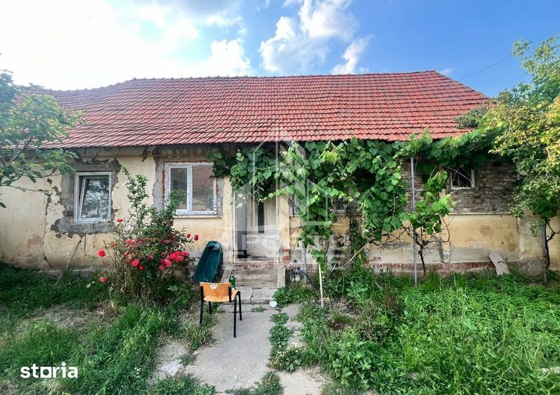 Casă cu 2 camere cu Teren 1438 Mp în Central