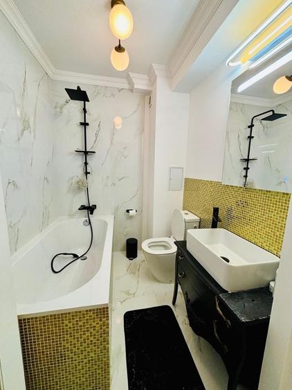 Apartament cu 3 camere semidecomandat în Muncii