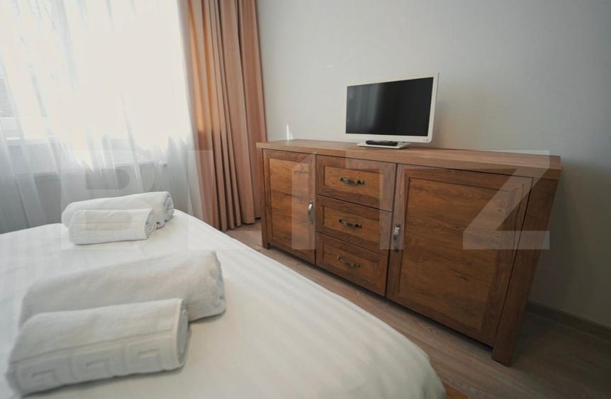 Apartament cu 2 camere semidecomandat, mobilat în Ultracentral