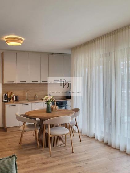 Apartament cu 3 camere semidecomandat, mobilat în Borhanci
