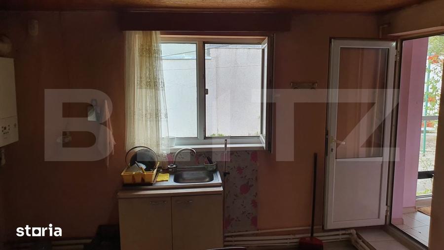 Casă cu 2 camere cu Teren 445 Mp în Piața Centrală