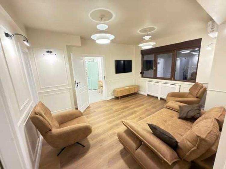 Apartament cu 3 camere semidecomandat în Romană