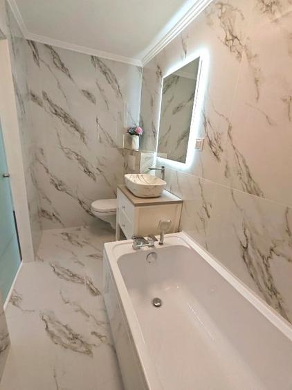 Apartament cu 4 camere decomandat în P-ța Muncii