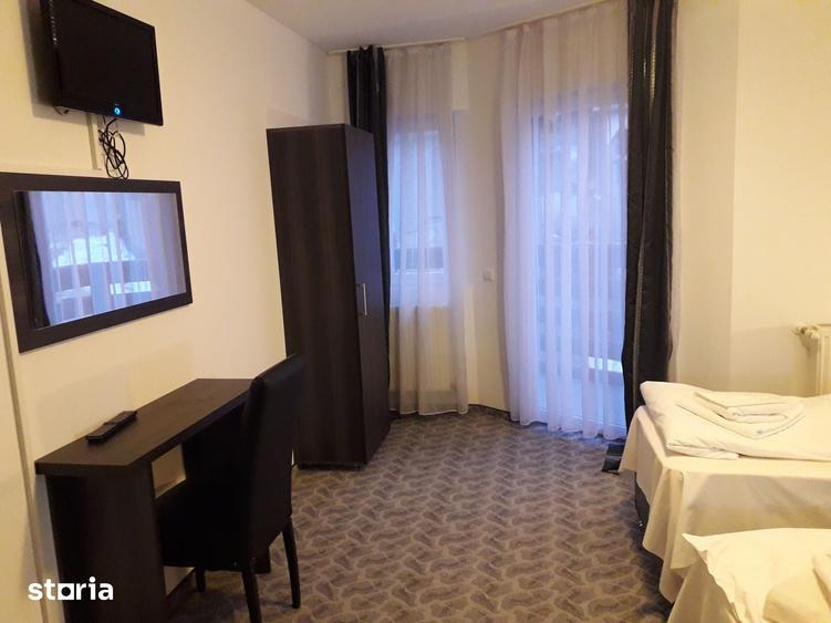 Casă cu 10 camere cu Teren 360 Mp în Central