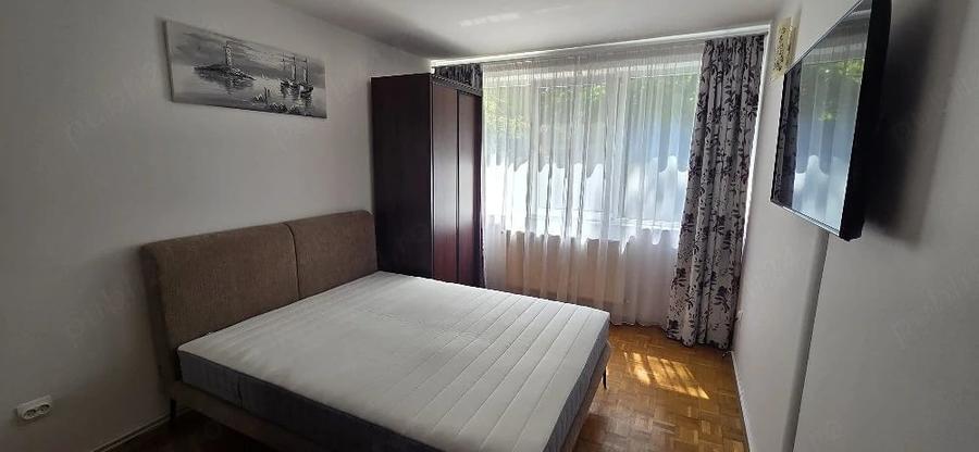 Apartament cu 3 camere semidecomandat în Muncii