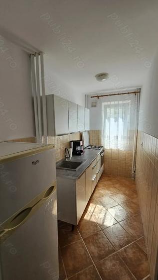 Apartament cu 2 camere semidecomandat în Podu Roș