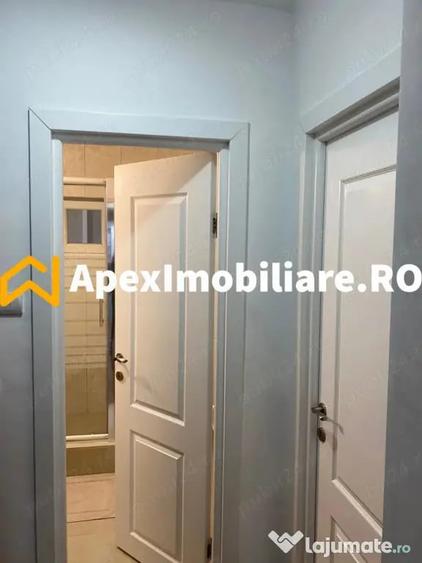 Apartament cu 3 camere semidecomandat, mobilat în Central