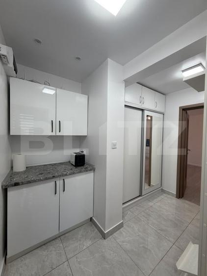 Apartament cu 2 camere semidecomandat, mobilat în Central