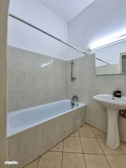 Apartament cu 4 camere decomandat în Romană