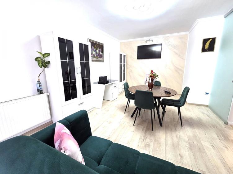 Apartament cu 2 camere semidecomandat, mobilat în Bună Ziua