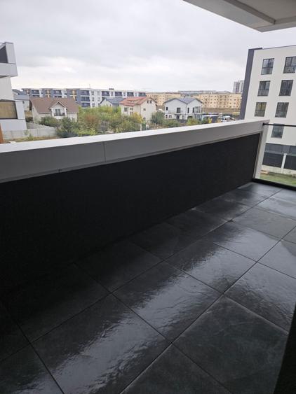 Apartament cu 3 camere decomandat în Cățelu