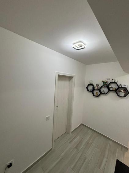 Apartament cu 3 camere decomandat în Cățelu