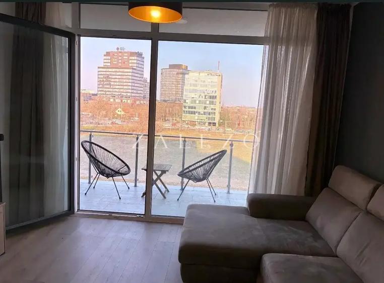Apartament cu 2 camere semidecomandat, mobilat în Central