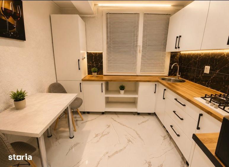 Apartament cu 2 camere decomandat în Podu Roș